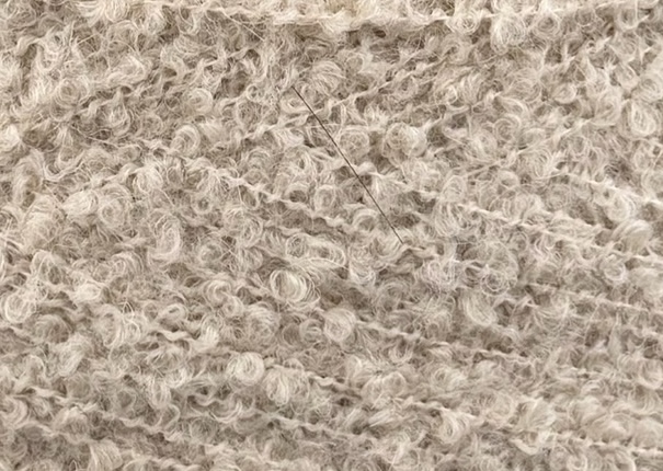 New Mill Art. Cancun – Bouclé-Garn mit Baby-Alpaka col. Sandbeige 280 m / 100 g